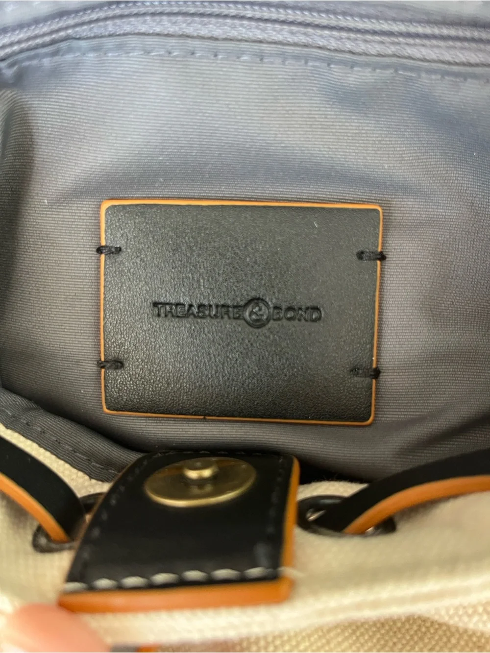 Treasure & Bond Canvas Backpack with Black Leather Flap and Tan Trim
